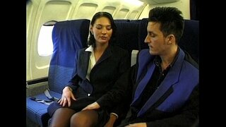 Brunette dexter wearing stewardess uniform gets fucked on a plane